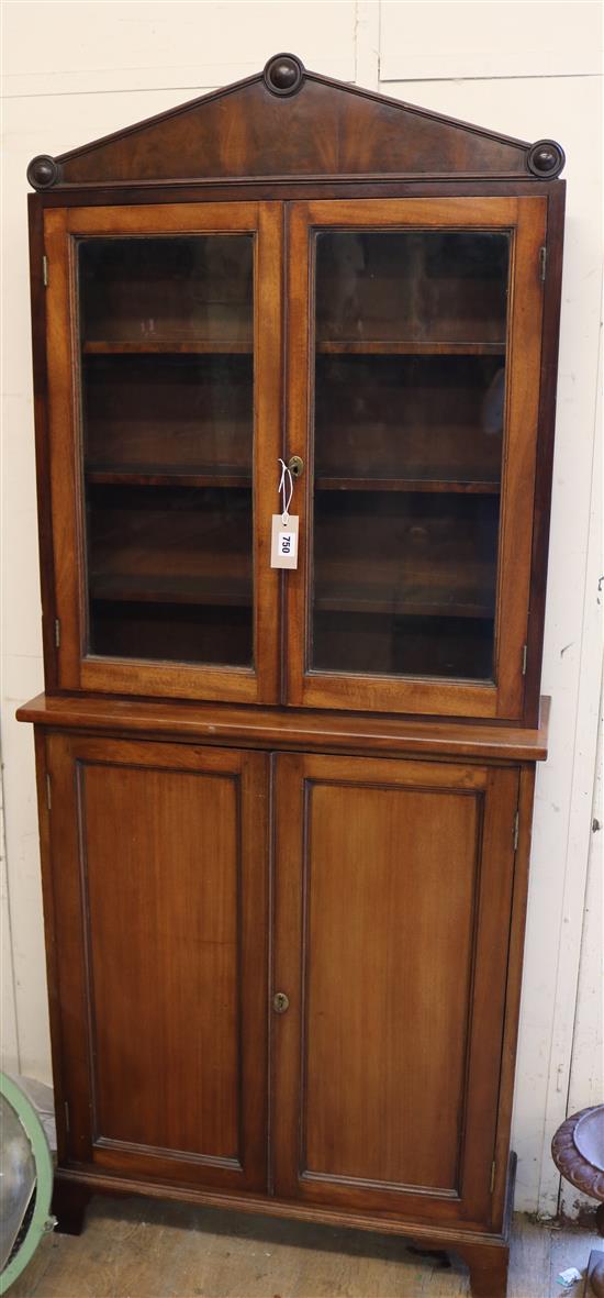 An early Victorian mahogany bookcase cupboard W.74cm